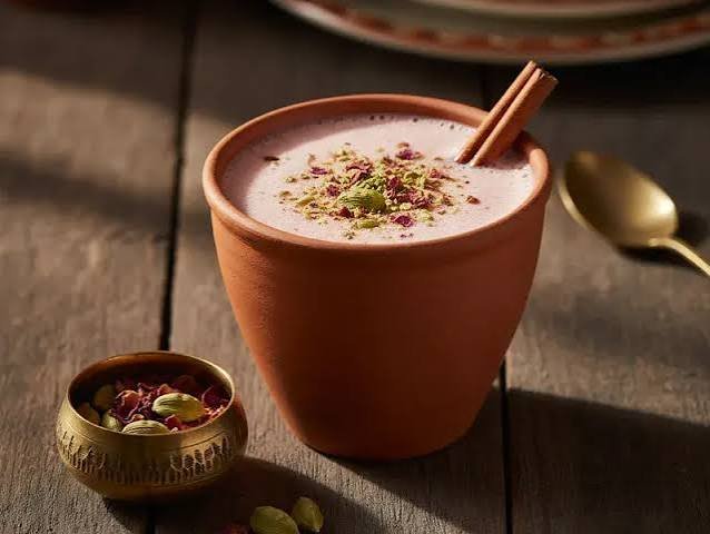 Kashmiri pink chai topped with crushed pistachio